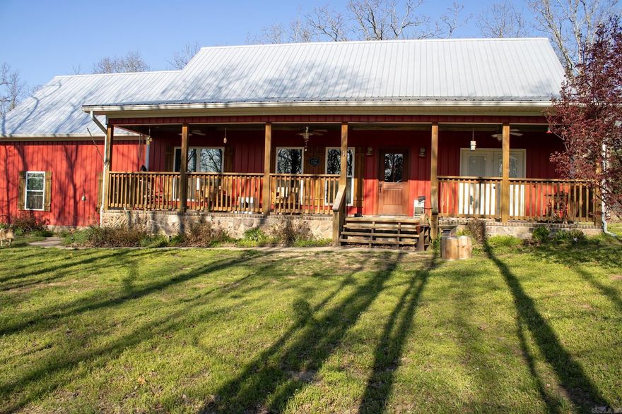 Escape to peaceful country living with this rural residential retreat set on 20 beautiful acres. This 2-bedroom, 2-bath home is tucked into a quiet country tract, offering privacy, space, and endless outdoor enjoyment. Relax on the welcoming front porch and take in the surrounding natural beauty, with plenty of room to explore, hunt, or unwind by the pond—perfect for fishing and quiet reflection. Inside, a cozy sunroom with a fireplace provides a warm, inviting space to enjoy year-round views of the land. The property also features a two-story storage building ideal for equipment, hobbies, or extra storage. A heated and cooled 30x40 shop with a fully functional bathroom adds incredible versatility, whether for work, recreation, or projects. With 52 solar panels helping reduce utility costs, this property combines comfort, functionality, and efficiency. A rare opportunity to enjoy wide-open space and true country living. See Agent Remarks