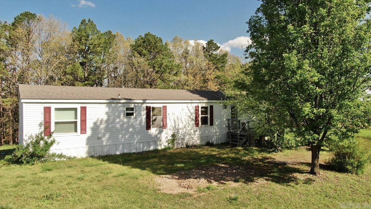 Welcome to 593 Hillhollow Road, a rare opportunity to own 37.09 (+/-) beautiful acres in Marshall/Morning Star, AR. This property includes a well-maintained single wide mobile home, ideal as a full-time residence, weekend retreat, or a place to stay while you build. The land offers a scenic blend of pristine pasture and mature timber, providing both open space and wooded privacy. A year-round spring-fed creek runs along the back, adding charm and a steady water source. With no restrictions, this property is full of potentialāperfect for homesteading, livestock, or simply enjoying the peaceful Ozark mountain setting. It could also serve as a personal getaway or a nature-focused Airbnb. Abundant wildlife, quiet seclusion, and stunning views make this a true gem. Located just a few miles from the South Maumee access on the Buffalo National River, you'll have easy access to some of Arkansasās best floating, fishing, and hiking. Whether you're looking to live, escape, or invest, 593 Hillhollow offers the best of rural Arkansas! Call to set up a showing-- don't miss out!