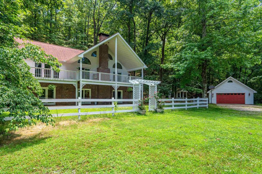 Welcome to your dreamy country retreat! Nestled on 12 beautiful acres (3 lots), this private oasis offers the perfect blend of comfort, charm, and functionality. The property features a spacious home surrounded by mature trees and open pasture, ideal for enjoying peaceful country living. A well-equipped barn with 4 horse stalls, a chicken coop, and a greenhouse making it perfect for those wanting to embrace a self-sustaining lifestyle or hobby farming. Cool of on hot summer days in the sparkling above ground pool, or unwind on the patio overlooking the serene, natural landscape. Whether you're looking for a homestead, a horse property, or simply room to roam, this property delivers with space, versatility, and stunning views. Enjoy the best of rural life while still being conveniently located to nearby amenities. Don't miss this rare opportunity to own your own slice of paradise!  Natural Springs features a private lake for fishing and enjoyment! As a bonus, this home is located just minutes to Hot Springs or Hot Springs Village! Ask about access to 11 Lakes, 9 Golf Courses, 30 miles of walking trails, pickle ball, tennis, fishing, and so much more!