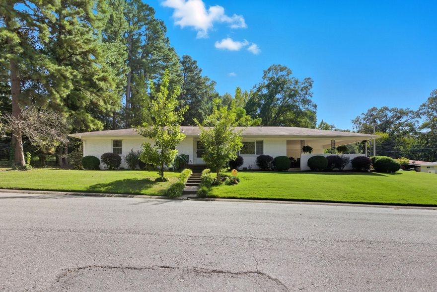 Beautifully updated but keeping the charm of a mid-century home, this is exactly what you have been looking for in Downtown Benton. This home includes two over-sized bedrooms with adjoining bathrooms, two living areas and a great size kitchen. The back yard has an adorable patio perfect for hosting friends and it includes a 2-car carport. Flooring, paint, appliances, countertops, etc have been updated on this one as well as an exterior paint refresh. Book a showing today!
