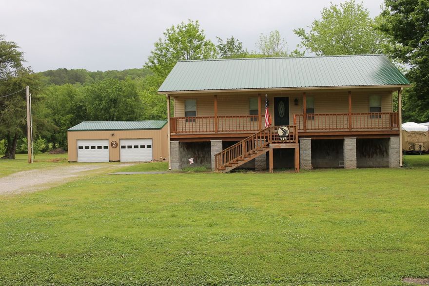If you are looking for that quiet place to relax down by the White River with a rare charm, this is it! Walk off the front deck, down to the White River and fish, launch a boat or stroll down and check out the unique resort style cabins. Inside this cozy home, relax or unwind with friends or family in this open concept living/dining/kitchen with large island. On one side of the central area of the home, you have a good-sized pantry, and the private large master suite with full bath, dual vanity, and walk in closet. On the other side, is a 2nd junior master suite with private bath, single vanity and walk in closet, hall bath for guests and well-appointed laundry with extra closet, counter space, rinse sink with room to move around in. Off the kitchen out back, is a screened in back porch, a smaller porch for grill, large oversized concrete patio to enjoy entertaining and taking in the views of the mountains and surrounding scenery. Home comes with a full home 20KW generator, under home storage, oversized 2 car garage/workshop, 50x14 Carport w/electric, shed. Call and Let Us Show You this BEAUTIFUL home today! 870-214-3696