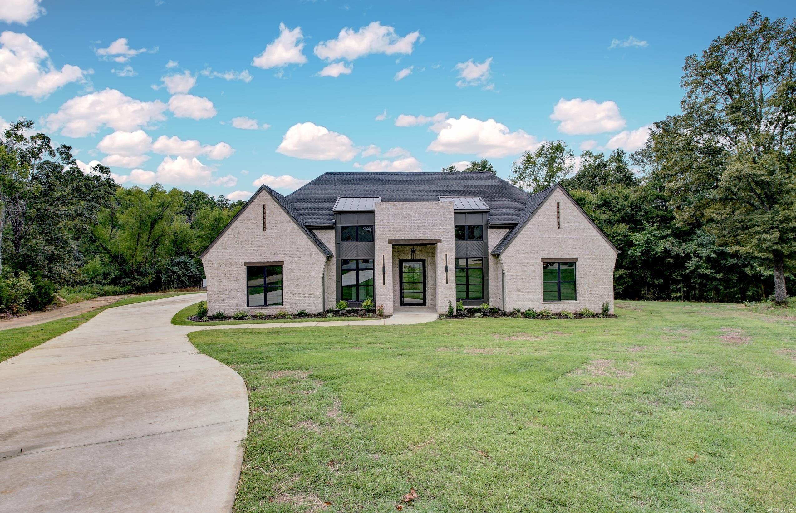 Custom Home built & designed by Lafever & Co. Builders. No detail was overlooked in the design of this home. From the 18' ceilings in the dining room to the wine display rack, to the large back porch and energy efficiency build practice. You will love this home. LED accent lighting throughout the home. Massive 5'x9' iron pivot front door is stunning. large back porch with fireplace. Master suite will leave you breathless! so many other details!!