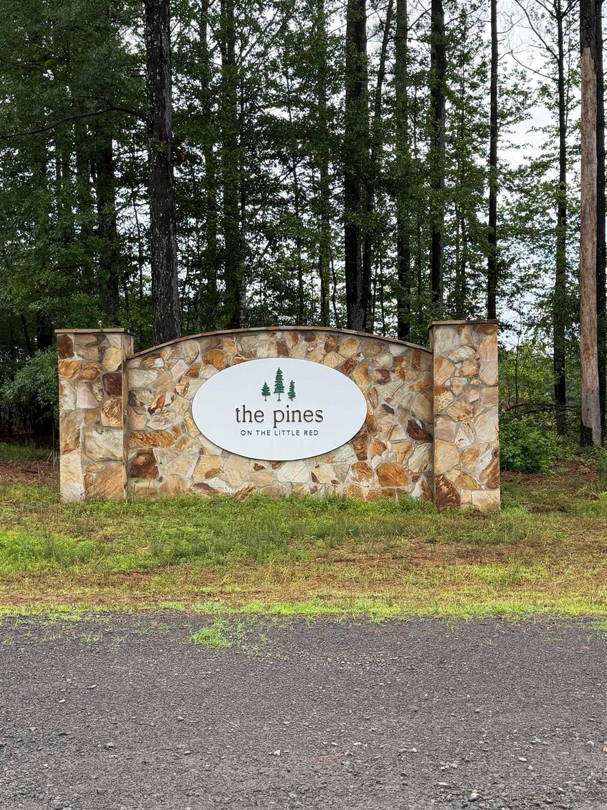these lots are separated buy road but are being sold together. This subdivision has a private gated boat ramp into the Little Red River Lot 10 is waterfront. I have a copy of the restrictions on hand, No mobile homes allowed