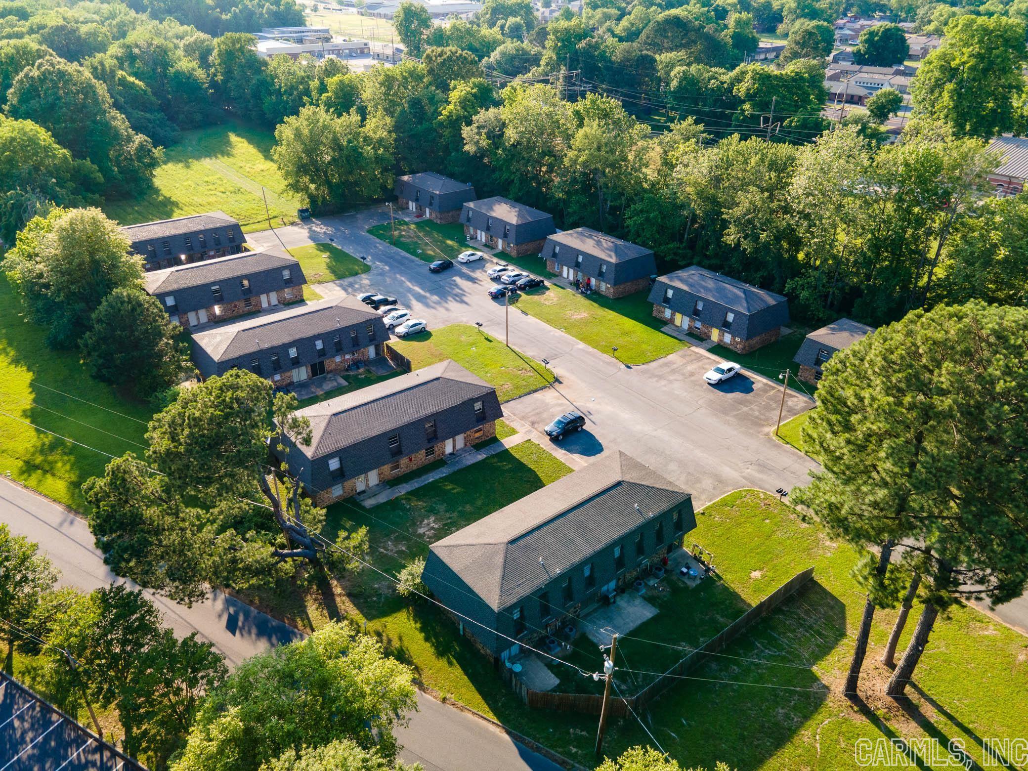 Check out Stonegate Manor Apartments. This 34-unit apartment complex with substantial value-add potential in Searcy located just one mile from Harding University, where nearly 5,000 students attend class daily. Not only this, but it also sits just South of E Beebe Capps Expy which has a 19,000 average VPD count as well as numerous businesses that sit on it. The Stonegate Manor Apartments have 34 units that are 2 bed/1 bath and a single unit that has had the bottom floor converted to the laundry room for the entire complex. There are 2 washers and 2 dryers in this unit. The upstairs has been walled off from each side upstairs but could be expanded into for additional rooms with additional rental income. The property sits on 1.76 acres with an approximate total rentable square footage of 28,900 SF before counting the untapped potential of the upstairs of the laundry unit. It is comprised of 10 buildings. Property management is currently being handled by a local third-party company. The property is currently sitting at a 47.05% occupancy with 16 out of 34 units rented. The current owners have done many updates since taking ownership including both interior and exterior improvements.