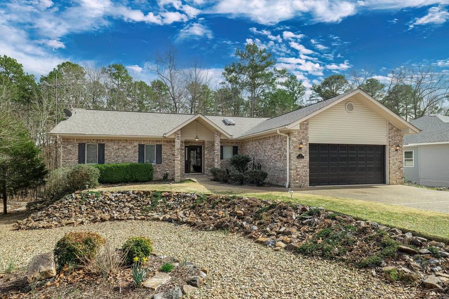 Great location near East Gate and on a quite short street. This 3 bedroom, 2.5 bath home features a large kitchen with center island; dining room with wet bar. Upper level has generous owner’s suite; Arkansas/Sunroom, laundry room and half bath.  Lower level has family room, two bedrooms with double closets and bathroom with shower.  There is also a screened porch and backyard is partially fenced. Attractive street appeal with flat driveway. Flooring is luxury vinyl and tile.  Propane fireplace. New kitchen appliances remain. House offers plenty of storage, Owner does quilting projects and has plenty of storage for supplies and long arm. $2,000 POS buy-in fee collected at closing. SEE AGENT REMARKS There is a $2,000 POA buy-in fee.