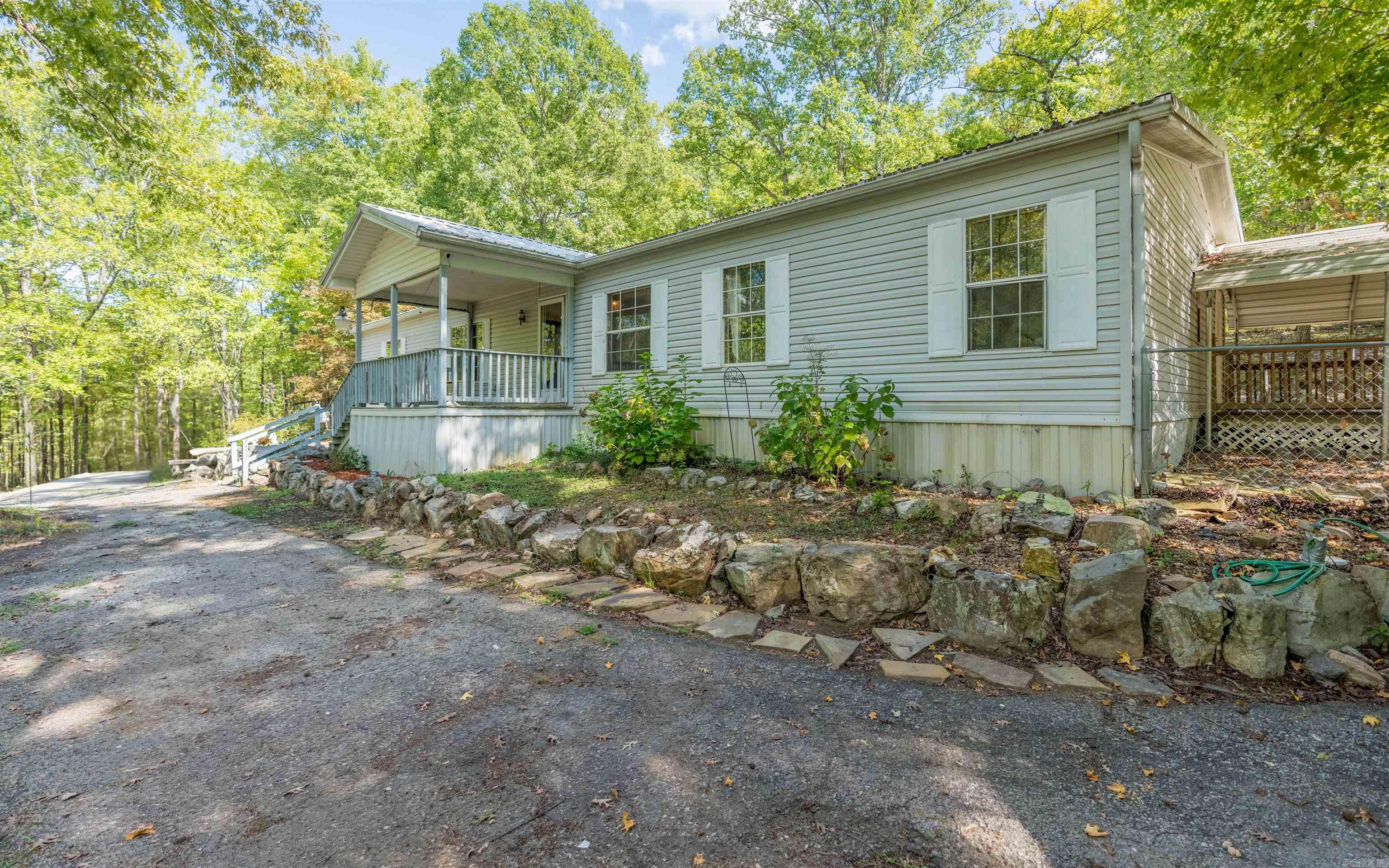 Rare Opportunity!!! 2 Homes on 2.62 Acres + 660 sq ft Detached Shop/Garage! Live in one and rent the other, or great for an extended family situation! Concrete Floor in Garage + Shop Area. Room for chickens, goats, etc. Property is on Septic and Well. Primary Home is 1822 sq ft (with 3 Bedrooms and 2 Baths) and the second smaller home is 504 sq ft (with 1 Bedroom and 1 Bath) - per appraisal. Current renter of smaller home is willing to stay - if desired.