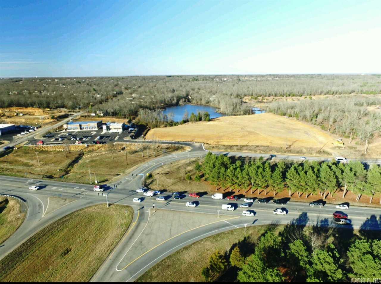 Prime location in Cabotās newest Commercial Development! Site fronts W. Main & Willie Ray Dr. Just off signaled light, site benefits from cross access easement w/adjoining center which includes David's Burgers & Med Express. 1-6 Acre parcels range from $6.50-$15.00psf. Will build to suit, ground lease options, & more. Features Cabot's highest combined traffic count of 61,800vpd along Main & Hwy 67/167. Cabot is underserved commercially for its 25,000 residents & 90,000 patrons in service area.