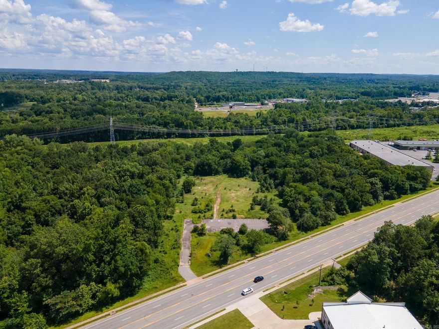 Rare opportunity to own 9.09 acres of commercial property in a high-traffic area of Little Rock. Located on Stagecoach Road (Highway 5), this property offers excellent visibility, convenient access to I-430 and I-30, and is ideally positioned for a wide variety of commercial uses. The property includes a paved parking lot, level topography, and public utilities nearby. The acreage is mostly cleared and ready for development, making it an excellent site for retail, office, warehouse, storage facility, or mixed-use projects. Zoned Commercial. Key Features: 9.09 acres of commercial land High-visibility frontage on Stagecoach Rd Existing paved parking lot Easy access to major highways Ideal for development or investment Public utilities available or nearby Don't miss this strategic investment in a growing area of Little Rock. Buyer to verify zoning, permitted uses, and utility access. Call today!