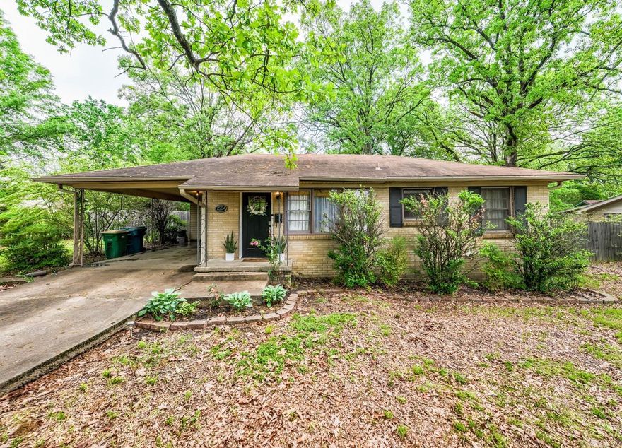 Come see your fully updated all brick home on a double lot conveniently located in Midtown just a short 7 minute walk from Meriwether Park.  You'll be welcomed into your living with original hardwoods that opens into your fully updated kitchen with tile floors, marble countertops, subway tile backsplash, and stainless steel appliances with fridge that can stay.  There's no carpet in your new home as the original hardwoods carry throughout your bedrooms and your updated bathroom has tile floors and a granite countertop.  Recently audited for energy efficiency with Nest smart thermostat to save on your utility bills. Your storage room in the carport is a spacious place to store your all of your holiday decor or function as a workshop.  Your huge fully fenced backyard is lined with beautiful trees and landscaping and has a newly added patio area to host your friends and family.  We can't wait for you to come and see if it's yours.  Welcome home!