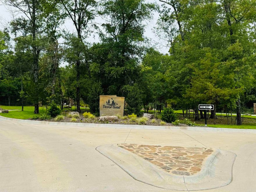 Maumelle's newest Gated Subdivision centered around the tranquil White Oak Bayou.  LEVEL LOTS! GATED ENTRY WITH PRIVATE ROADS! Come Build your Dream Home in the lovely Devoe Bend subdivision in Maumelle.  Minimum Square footage is 2500.  You will fall in love with this thoughtfully designed subdivision embracing all of nature's beauty!  A development focused on preserving the tree's and surrounding natural landscape.  Enjoy the area Walking trails, Kayak launch, Community Fire pit and lovely Bayou Views!  NO FLOOD INSURANCE IS NEEDED!  Special Assessment applies in lieu of an Annual HOA.  Agents See Agent Remarks.