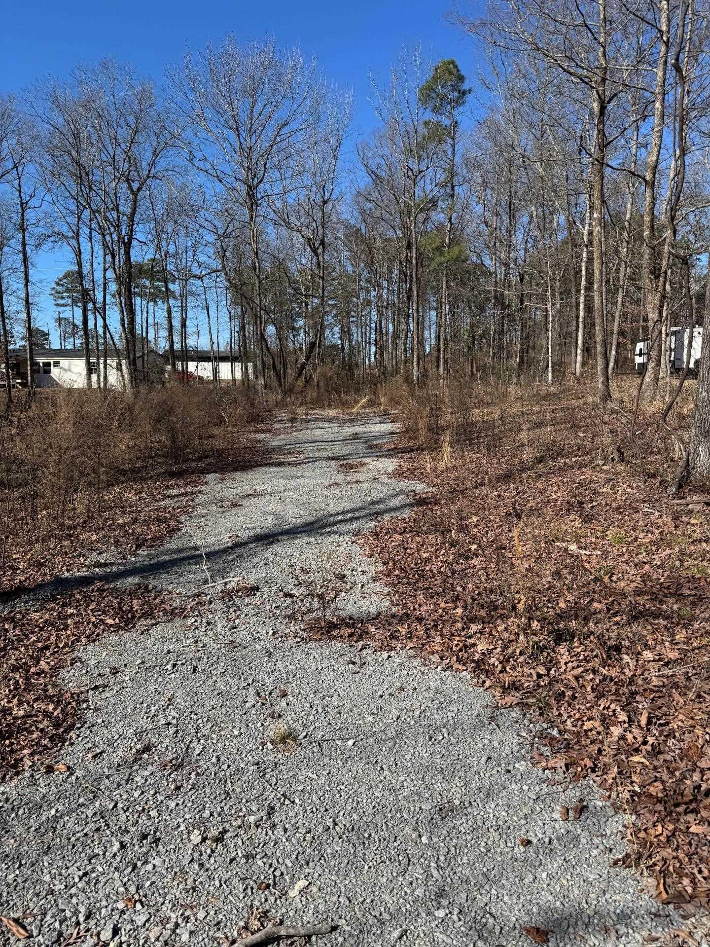 Doublewide or site built homes only. 1200 sqft min. Water and power available at the road. Some clearing was started. Driveway and culvert was done. Pad was built. BOA on file. Survey on file. No SPD owner has not lived on property. Contact agent for info, Land in this area is going fast so hurry.