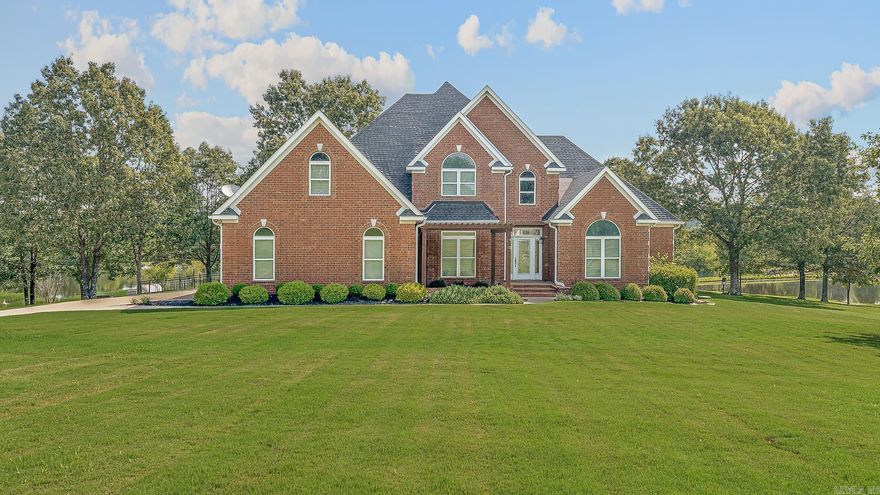 This stunning 4.32-acre property offers resort-style living with breathtaking lake views. A private pool with waterfall, outdoor kitchen, and patio create the perfect retreat for entertaining. Inside, the main level features the primary suite plus a guest suite, with two more bedrooms and a bonus room upstairs. Thoughtful updates and modern finishes blend style and comfort, making this home as functional as it is beautiful. With incredible outdoor spaces and unmatched views, it’s truly a showpiece.
