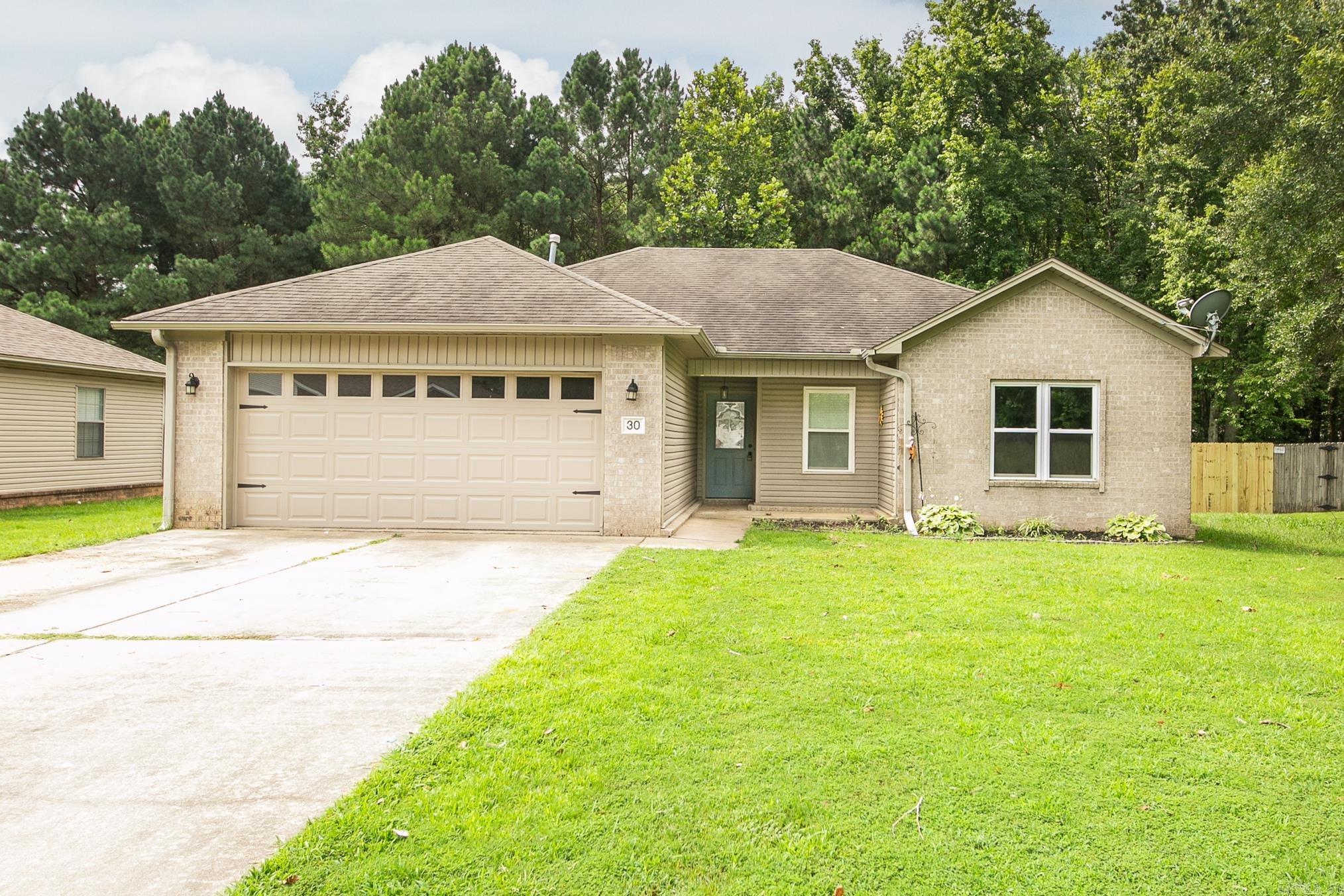 Move-in ready 3-bedroom home in the heart of Cabot, backing up to woods for privacy. Open layout with gas fireplace, breakfast bar, and split floor plan. Call to schedule your showing today! 2 Pets allowed with approval and restrictions/fees. No smoking in home or garage. Application/Background check/security deposit/renter's insurance required.