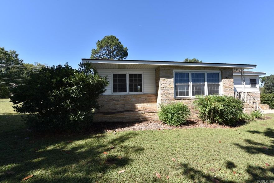 Welcome to this charming home nestled in the heart of Clinton, Arkansas! This well-maintained property exudes timeless character and offers a serene living experience. As you step inside, you'll be greeted by the warm glow of the hardwood floors, which gracefully guide you through the home. This classic feature adds a touch of elegance to every room. Nature enthusiasts will be thrilled to find large magnolia trees adorning the expansive yard. Offering both beauty and shade, these majestic trees create a picturesque setting where you can relax and enjoy the wonders of nature. For those seeking tranquility, the property seamlessly backs up to the South Fork of the Little Red River. Immerse yourself in the soothing sounds of the flowing water and revel in the peacefulness that surrounds you. With two baths available, convenience and privacy are guaranteed for both residents and guests alike. The well-designed layout of this three-bedroom home ensures ample space for everyone, allowing for a comfortable and flexible living arrangement. The generous yard provides plenty of space for outdoor activities. Located close to shopping and 10 minutes to Greers Ferry Lake.