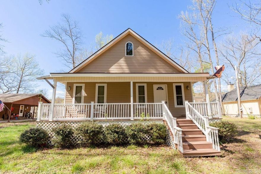 Riverfront Retreat: Embrace tranquility in this charming 3-bedroom, 2-bathroom home nestled along the picturesque Little Red River. This property offers the perfect blend of serenity and outdoor adventure. Enjoy fishing from your own private dock, and cozy evenings by the fireplace. Nice size bonus room upstairs and hardie board exterior.  Just a minute drive to Red River Trout Dock and across the river from Lindsey's Resort.  Perfect location!!