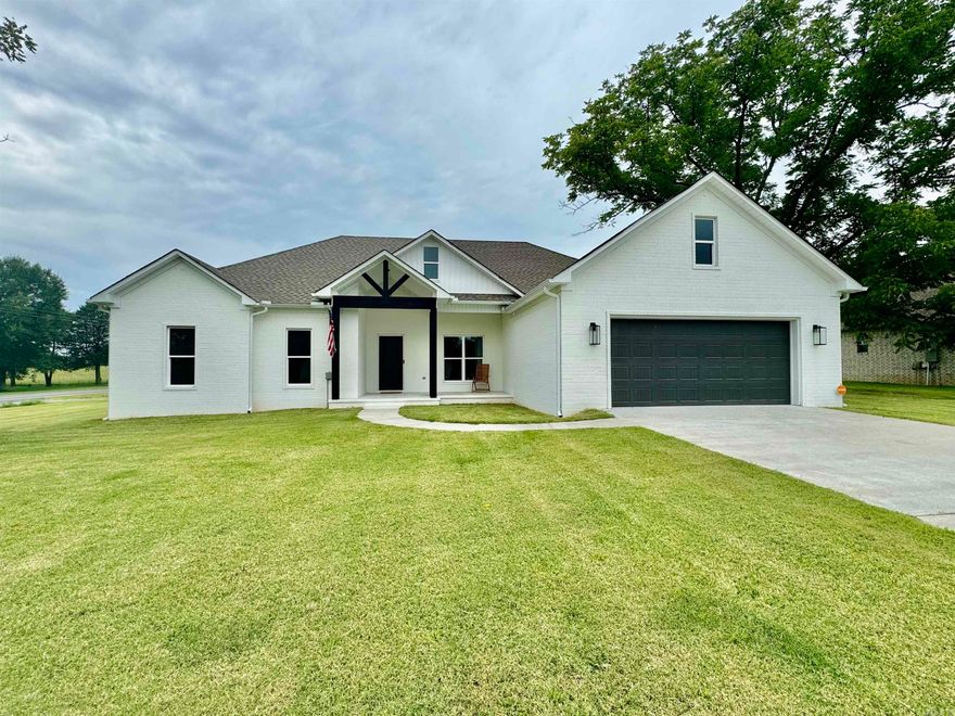 Beautiful 3BD 2BA PLUS A BONUS ROOM that could be a 4th bedroom or office on 1 acre of land. You will love the open concept living room & kitchen with a dining area off the front entry. Corner pantry with lots of cabinets in the kitchen, granite countertops. Nice view of the backyard from the kitchen. Master bedroom is separate from the guest bedrooms. Luxury vinyl flooring throughout and master bedroom has barn doors with a nice walk in shower. This home is a must see!!