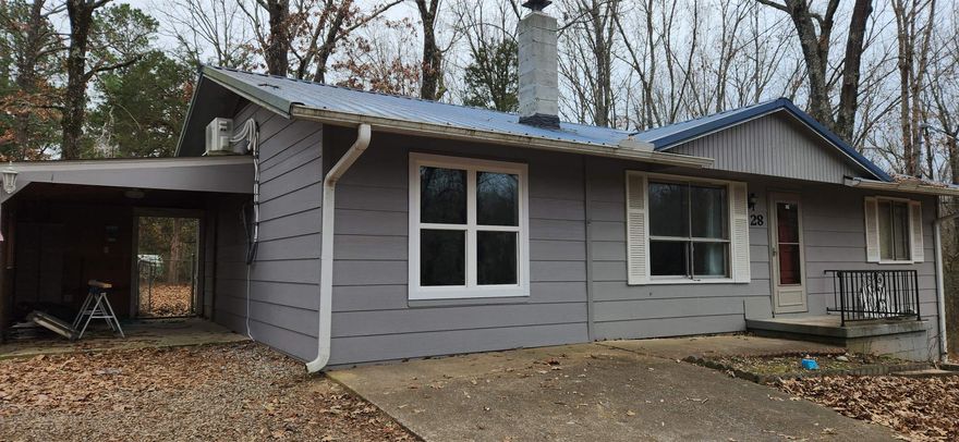 Cute three bedroom one and a half bath home on two lots is located near schools and village amenities. This home features central heat and air with a wood burning stove in the living room for family time. Quaint wooded area with fences and extra storage buildings gives you privacy and comfort for all your hobbies! Ownership comes with access to all Cherokee Village amenities including seven lakes, two golf courses and much more! Owner financing possible with acceptable terms. Broker owned.