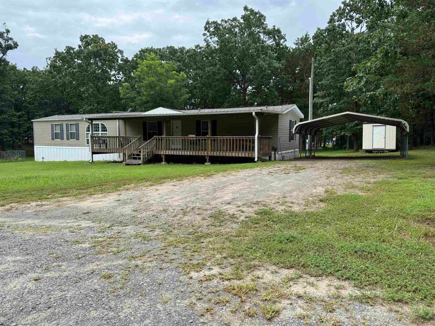 3 Bedroom, 2 bath mobile home in nice neighborhood. Home sits on 1/2 acre with a 20 x 20 metal carport and a 8 x 20 storage shed. Comes with a washer, dryer, refrigerator, dish washer, smooth top cookstove and a over the stove microwave. 9 x 40 covered front deck. New roof and new water heater in March. Close to Greers Ferry Lake. Check it out!