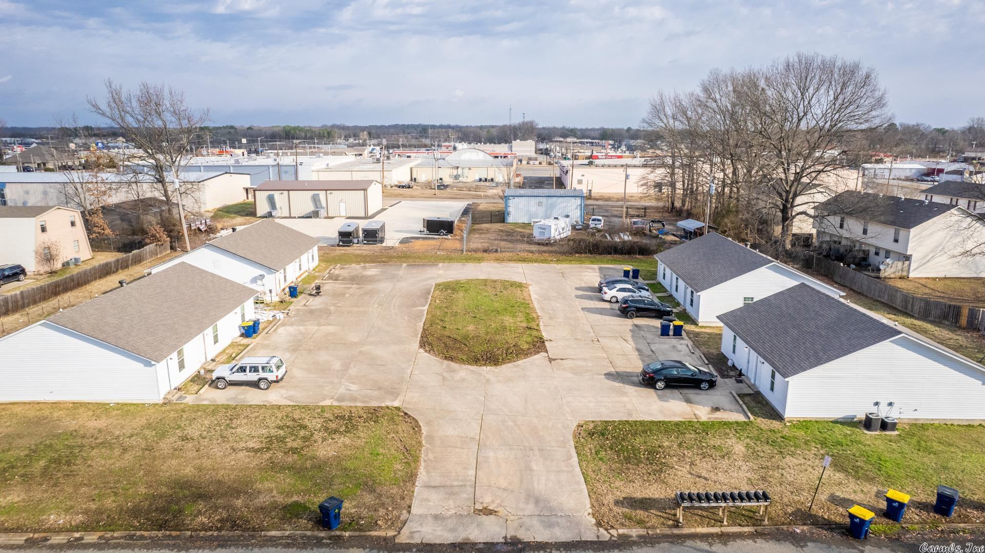 This is an updated 11 unit multi-family complex in the heart of Cabot, AR. There are 3 Triplex and 1 Duplex on the 0.91 acre property. All buildings have new roofs and siding. Most of the interior units have been updated similar to the pictures in the listing. The complex is conveniently located. it is less than a mile to the highway, within a 20 min drive to the Little Rock Airfare Base, steps from restaurants and shopping, and less than a mile to the city center. This complex is a diamond and would be a great investment property for a beginner investor all the way up to the seasoned investor. All buildings are on slabs. Give our listing agents a call for even more details about the property. Please text the listing agent in regards to showings.