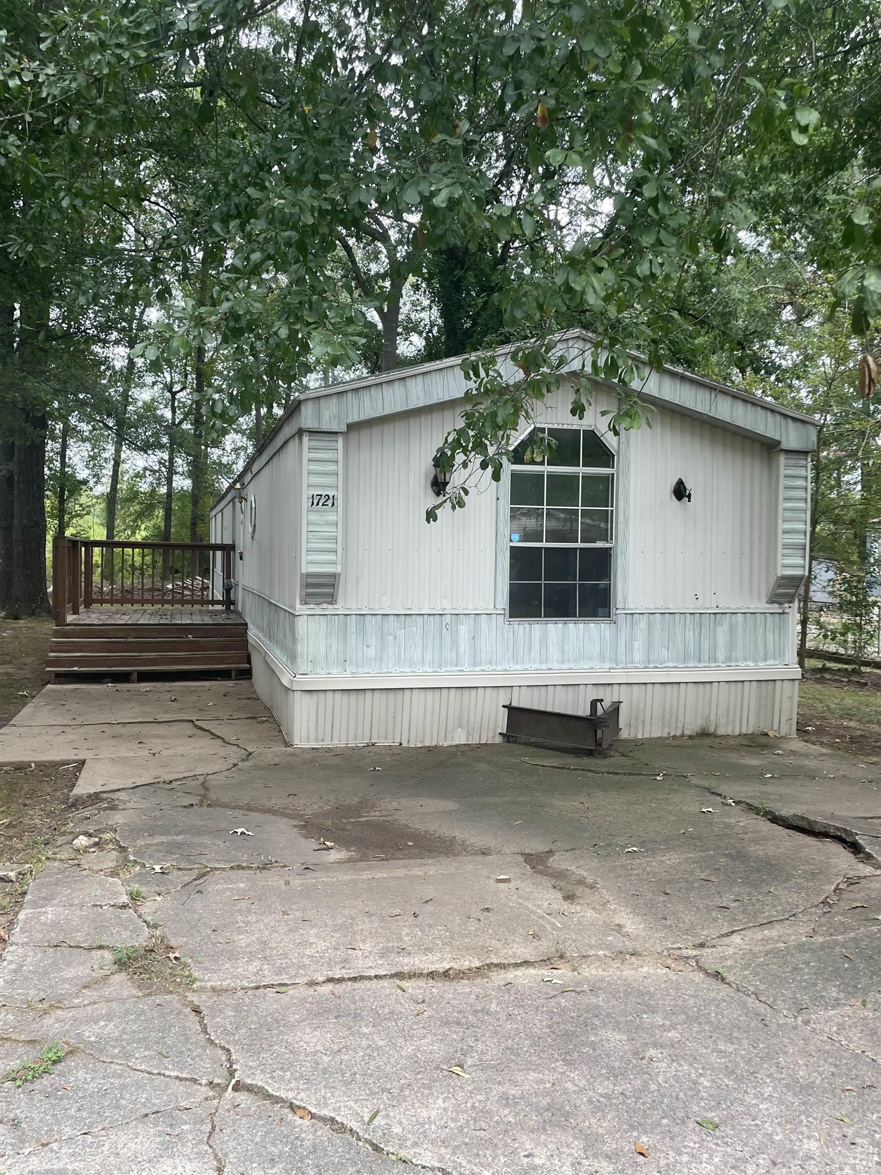 This fully remodeled mobile home features 3 bedrooms and 2 bathrooms, offering a spacious and modern living space. The open-concept layout includes updated flooring, fresh paint, and upgraded finishes throughout. The kitchen has been renovated with contemporary cabinetry, countertops, and some appliances for both functionality and style. Situated on a 0.27-acre lot, the property provides plenty of outdoor space for entertaining, or personal additions like a garden or play area. Conveniently located near shopping areas and schools.
