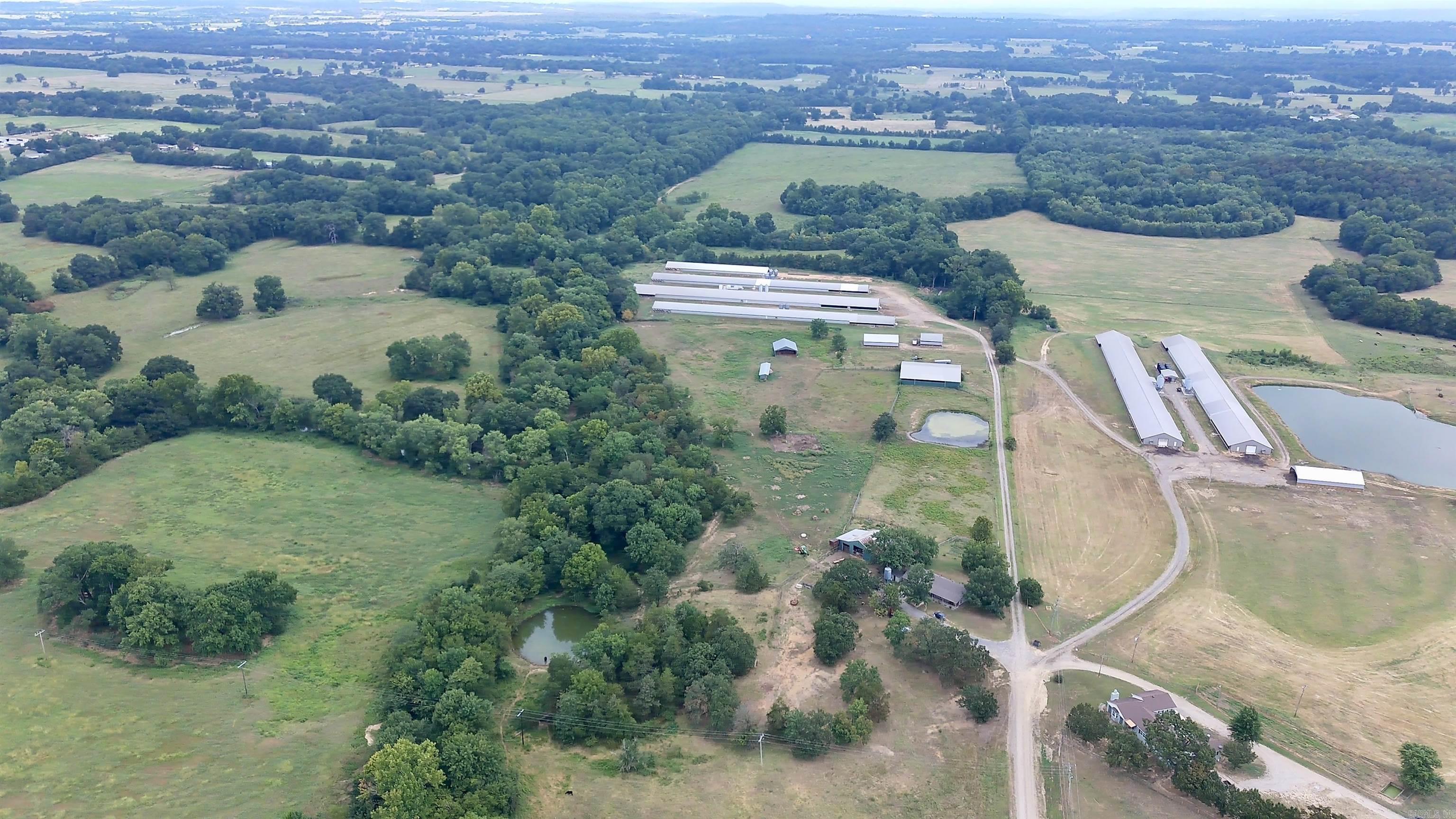 Exceptional 215± Acre Cattle/Horse Farm Discover this expansive 215± acre farm featuring a 1,344 sq ft home, an impressive 80x100 covered riding arena with office and bathroom space, a 40x70 hay barn, and a cattle barn equipped with working pens and a squeeze chute. The property also includes a 3-acre trap, a feed bin, and stunning Sixmile Creek frontage. Additional features include multiple ponds for livestock and irrigation. This farm offers a unique opportunity for equestrian enthusiasts and cattle operations alike. Don't miss out on this rare find!