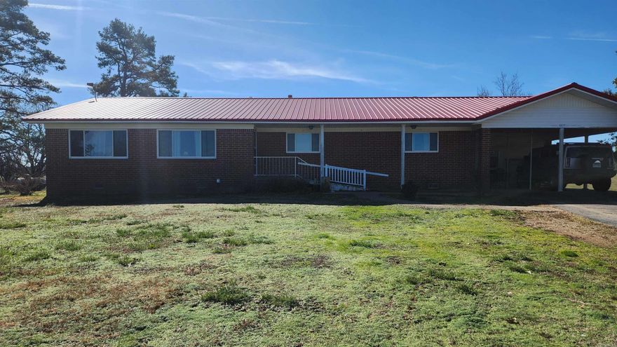 1.54 acres with 1736 sq ft brick home on Murphy Rd in Black Springs AR. 3 bedroom 2 bath built in 1973 has an amazing view out the dining room window. Kitchen recently upgraded with beautiful hickory cabinets. Original oak flooring in some of the rooms. Gas logs in the living room. No restrictions. Has a well and septic. Small generator. Metal roof.  New windows about 9 yrs ago. Washer/dryer, refrigerator, dishwasher, and gas cook stove with double oven all convey with the sale. Walk-in tub and wheel chair ramp for easy access. On-demand water heater. 19x22 carport, 20x28 workshop/storage building. Can be purchased with MLS#25019600 to make a total of 18.77 acres. Give us a call for your private showing.