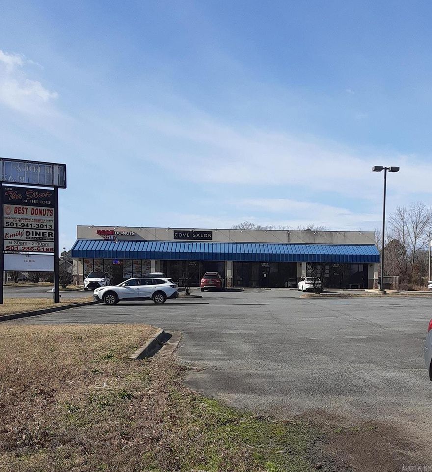 Great investment opportunity close to the interstate. 4 fully leased units with ample parking. This .93 acres also includes a buildable approximately 60'x60' section on the left rear corner of the property. Act now, this may not last long.