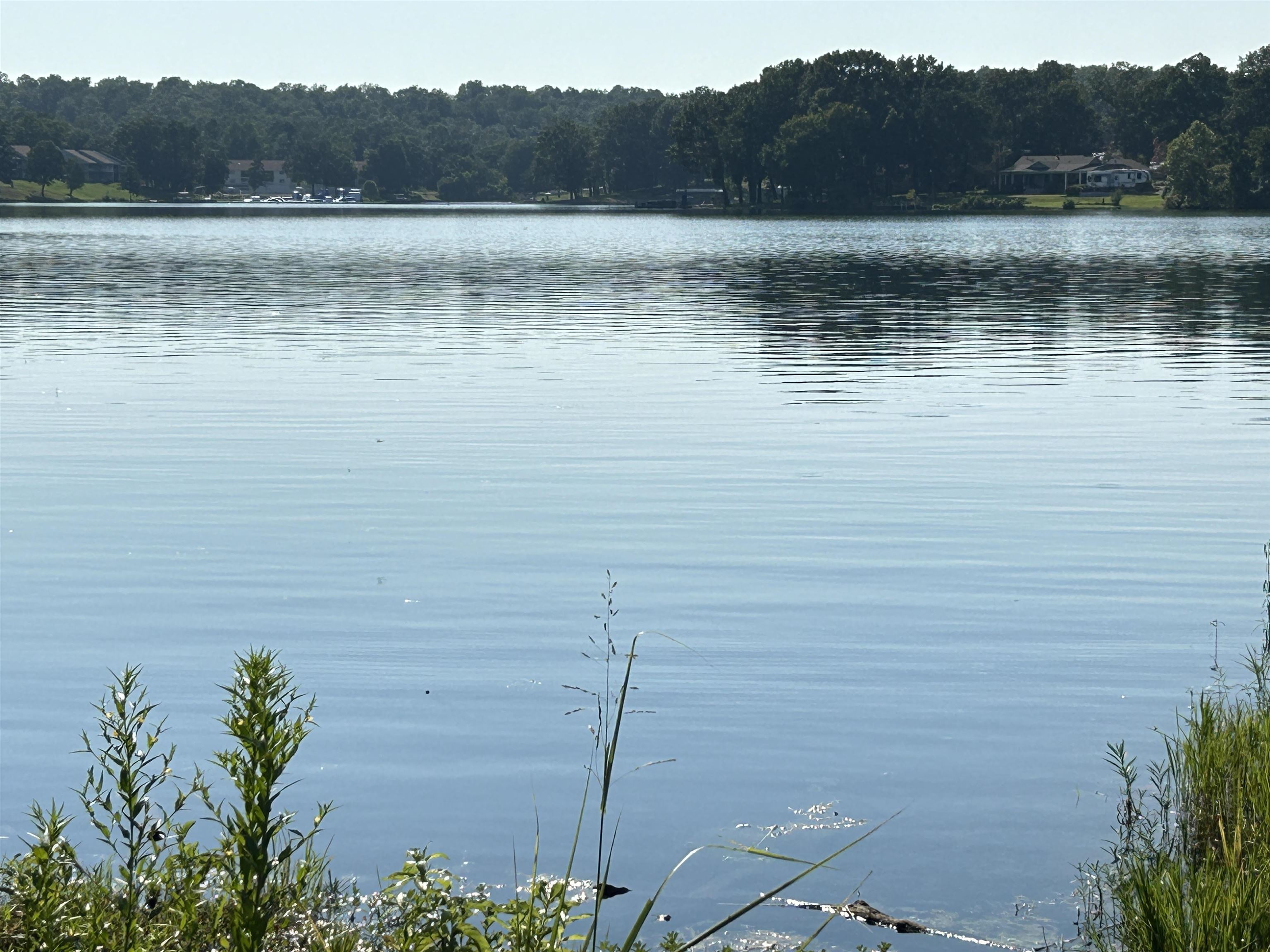 Crown lake lot with a 100 feet of lake frontage. Lot is cleared and has had a perc test in past. The lot is sloped down to lake which would be perfect for digging a walk out basement. Beautiful views of the lake, and setting on a cul-de-sac with few houses.