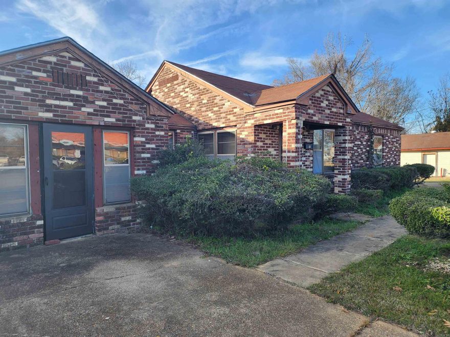 Investment Opportunity! This 3 BR/ 2 BA brick home sits on a large lot. Needs some TLC and is being sold As-Is.