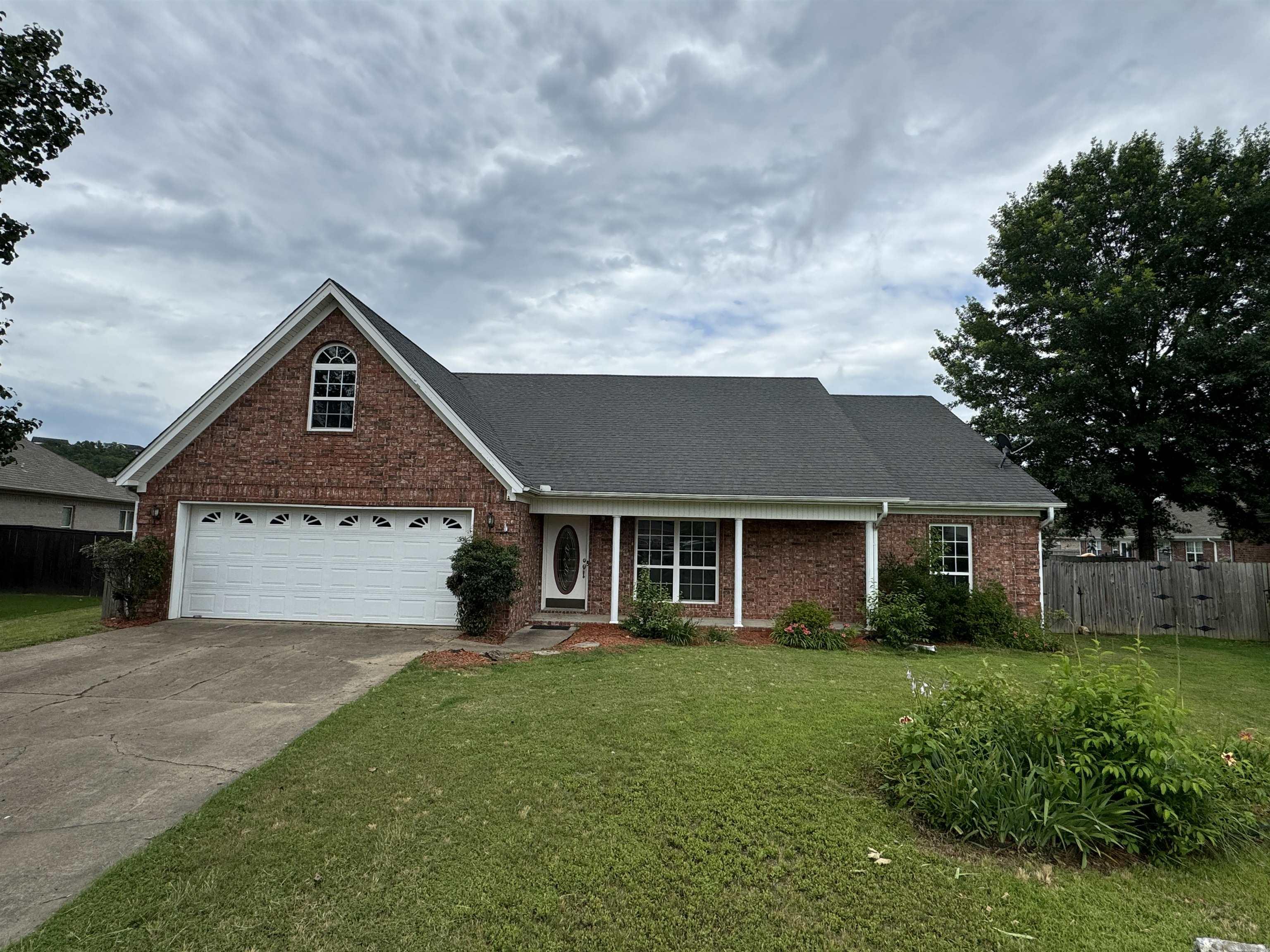 LAKEFRONT Magness Creek Home with a dock. Great floorplan in this 4bd/2ba home. Fireplace and tray ceilings in the LR. Larger primary bedroom with multiple closets. Fully fenced backyard with large covered backporch. Tons of potential. Call today for your personal tour!