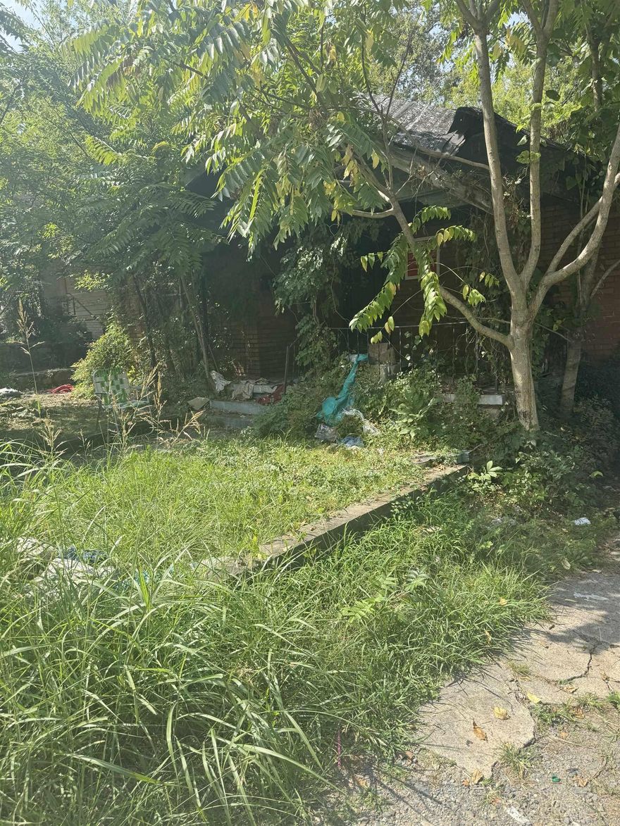 This house has been officially condemned by the city of Little Rock.  Do not attempt to enter the house.  However, this residential lot is available in an up-and-coming neighborhood. Ideal for building your dream home or as an investment opportunity. Don't wait!  Bring you offer today!  SEE AGENT'S REMARKS!!!