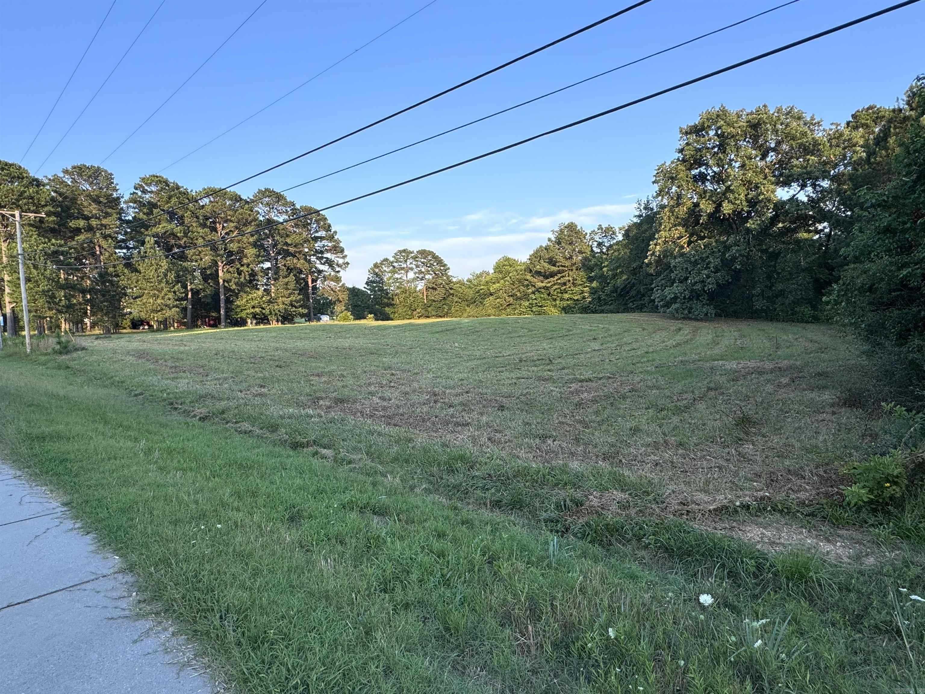 Discover endless possibilities with this prime 3.22 acre Commercial/Residential land in Caddo Valley! Conveniently located right off 1-30, this versatile property is ideal for entrepreneurs looking to start or expand a business, or individuals seeking to build their dream home. Situated close to businesses, a city park and police station this location offers unparalleled convenience and visibility. Additionally the lands proximity to the scenic Caddo River, Lake Degray and Arkadelphia, home of two colleges makes this the perfect investment opportunity. Don't miss out on the chance to own a piece of this thriving community!!