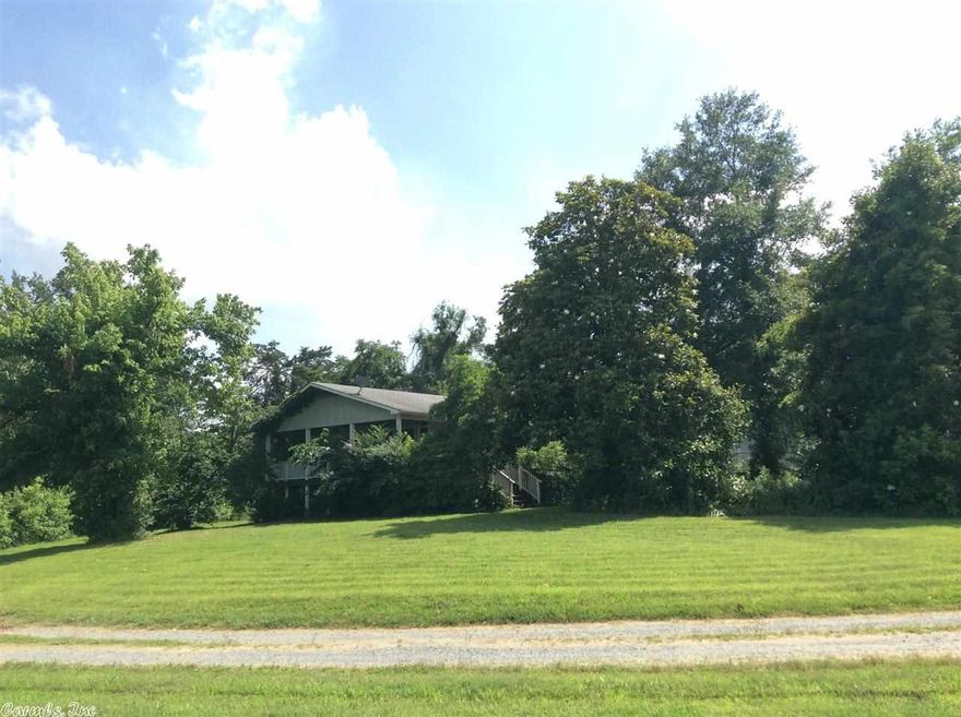 40 acres more or less of mixed pasture and woods. Beautiful 2400 square foot home with central heat and air, tile and hardwood floors.
