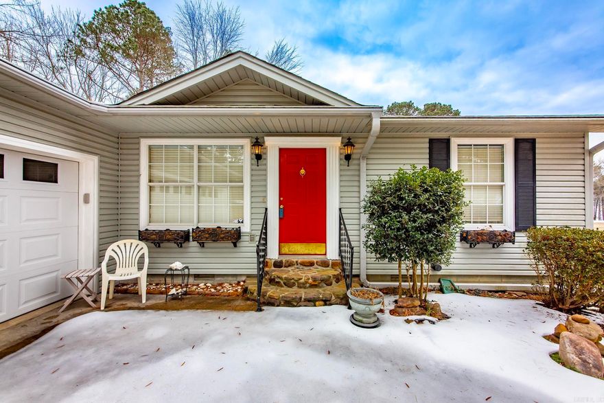 You will enjoy this charming home ready to welcome you, your family and friends to a lake front retreat. Nestled in a tranquil, wooded area on a gentle slope that descends right to the water's edge. Imagine cozying up by the fireplace with a glass of wine or hot cocoa in the winter and gathering outdoors to enjoy family and friends around a fire ring after a delightful day on Greers Ferry Lake. There is ample space for all your lake toys. Nearby amenities include marinas, restaurants, golf courses, ATV trails, walking paths, swimming pools, and much more.