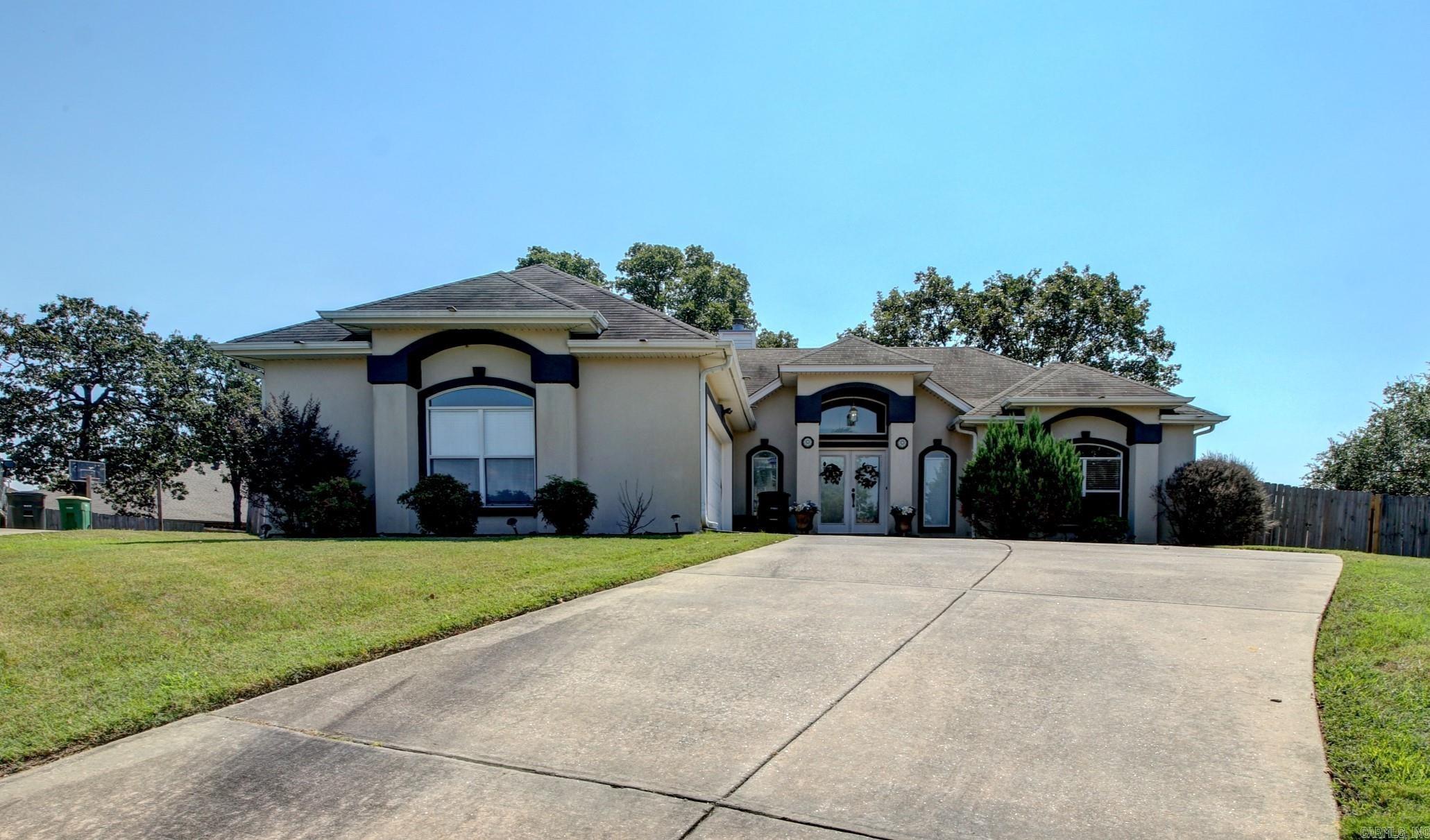 Beautiful home in Austin Lakes Addition located in the heart of Sherwood. Upon entering you will be greeted with vaulted ceilings, wide open space and tons of natural light. The floorplan is perfect for entertaining with a double-sided fireplace, open concept kitchen/dining/living. The back yard is oversized and has a nice deck/patio for all of you outdoor entertaining needs. Split floorplan with three bedrooms, two bathrooms. The primary suite is very spacious and includes a big soaker tub, step in shower and oversized closet. The remaining two bedrooms, guest bath and laundry room finish this one out. Agents...see remarks