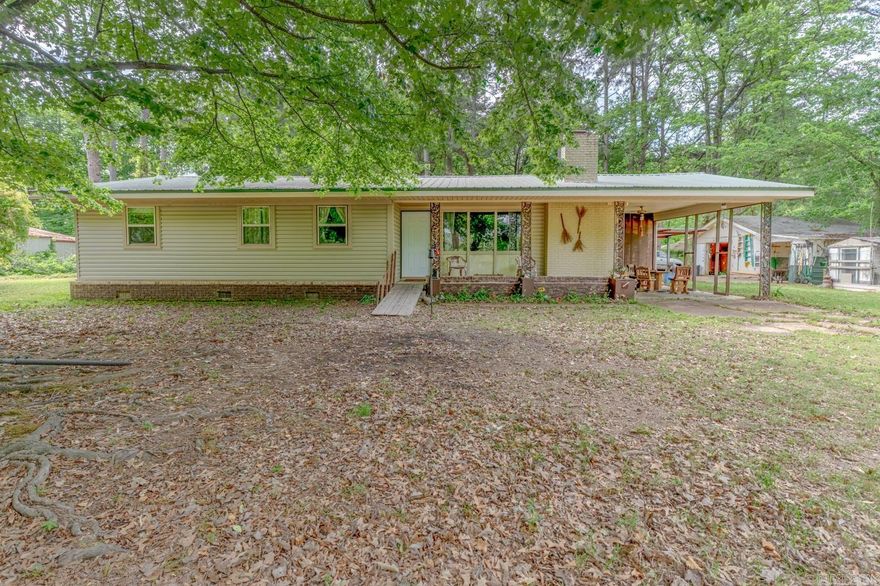 Welcome to the Market 123 Woodruff 897, a beautiful lakefront/view property on Horseshoe Lake in Augusta, AR. This property sits on 1.64 acres +/- and has 3-bedroom, 2-bath and offers 1,700 sq. ft. +\- of living space with central heating and air. Enjoy the lake views, private boat slips, and a detached electric garage/workshop. The home also features a tin metal roof, a rose tree, crape myrtle trees, privacy trees, and a wood-burning stove fireplace. Plus, enjoy the duck hunting area and hardwood floors in majority of the home. Schedule your showing today and explore all this home has to offer. This is a must-see property and it won't last long. Please see agent notes for more details.