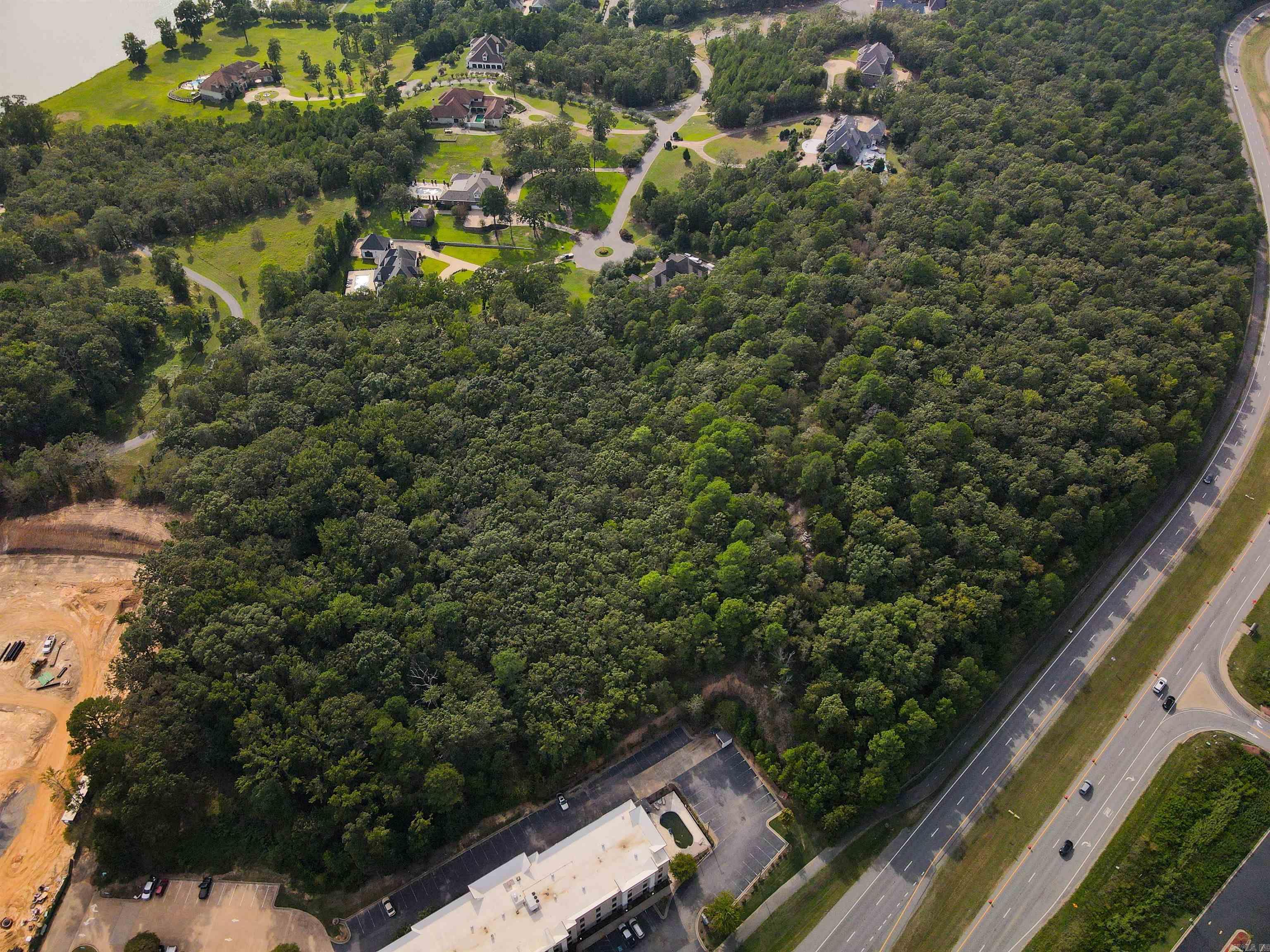 Come explore an exceptional multi acre development opportunity in one of the fastest-growing areas of Central Arkansas. This prime tract sits directly adjacent to a brand-new retirement community currently under construction, positioning it perfectly for complementary residential or mixed-use projects. Across the street, a bustling commercial center provides immediate access to dining, shopping, and essential services, while the nearby river and scenic surroundings add a unique natural appeal. With its combination of visibility, accessibility, and proximity to thriving residential and commercial developments, this property offers unmatched potential for investors, builders, or developers seeking to capitalize on growth in the Maumelle/Little Rock corridor. Whether envisioned for residential, senior living, medical, or commercial use, this site provides a rare chance to bring a high-impact project to life in a premier location.