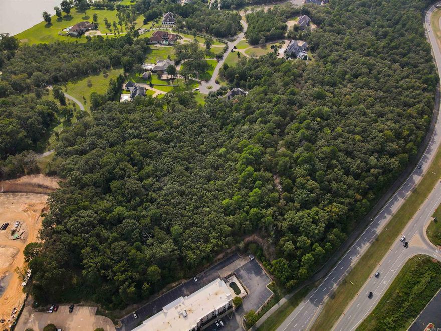 Come explore an exceptional multi acre development opportunity in one of the fastest-growing areas of Central Arkansas. This prime tract sits directly adjacent to a brand-new retirement community currently under construction, positioning it perfectly for complementary residential or mixed-use projects. Across the street, a bustling commercial center provides immediate access to dining, shopping, and essential services, while the nearby river and scenic surroundings add a unique natural appeal.  With its combination of visibility, accessibility, and proximity to thriving residential and commercial developments, this property offers unmatched potential for investors, builders, or developers seeking to capitalize on growth in the Maumelle/Little Rock corridor. Whether envisioned for residential, senior living, medical, or commercial use, this site provides a rare chance to bring a high-impact project to life in a premier location.