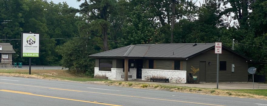 NOT YOUR AVERAGE SPACE......This one is Custom. Modern. One-of-a-kind. Just like your business! And it's on A Main Road with High Traffic - Completely renovate, Fully updated office featuring 3 private offices, a conference room, reception area, a break room, and 2 half baths. The interior includes LVT commercial flooring in high-traffic areas, carpet tiles in 2 of the private offices, barnwood accents, and black paint details for a modern, professional look.  The upgrades also include all-new wiring, updated plumbing with new fixtures, new insulation in walls and ceiling, new HVAC and duct work, new lighting, and Pella windows, with tint on the ones across the front, which include a limited transferable warranty. There is a hard-wired security system with cameras and monitors and fire safety equipment which is also included with the property. >>> The light over the conference table may not convey.