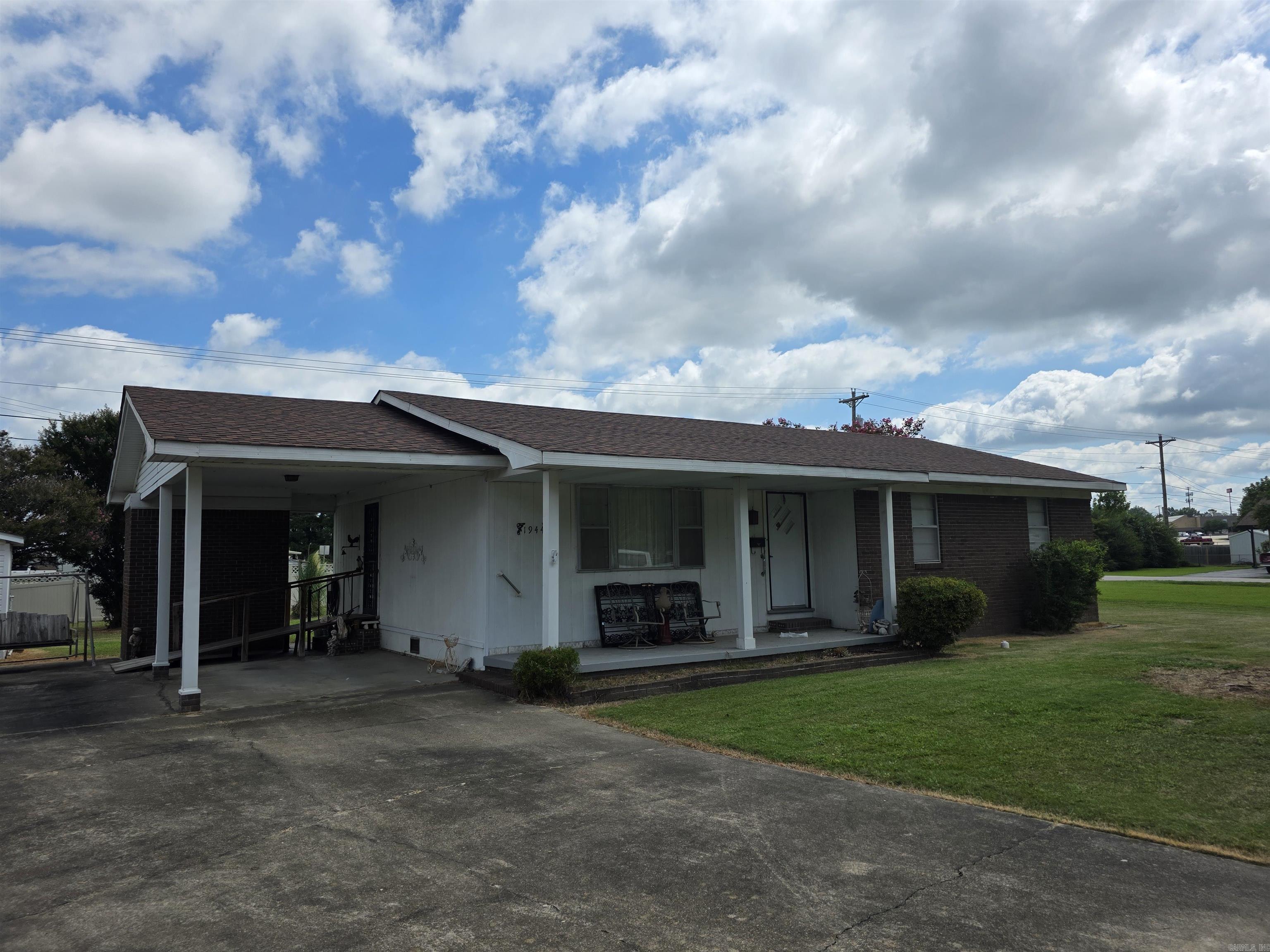 Three Bedroom 1 1/2 bath. This is a fixer upper. Floors seem solid, a roof is only a couple of years old. a/c works but it is old.