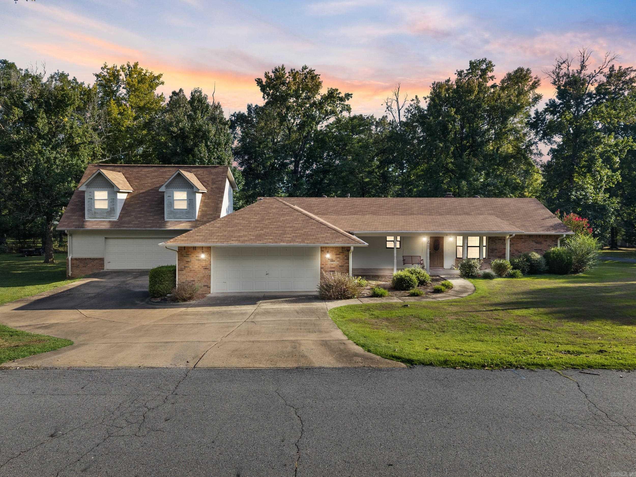 Well-maintained home on a corner lot in Vilonia offering 2 bedrooms and 2 bathrooms with a desirable split floor plan. The living room features a vaulted ceiling, creating an open feel. The property has been updated with a new roof, new HVAC systems inside and out, a new garage door opener, and a new trash compactor. The kitchen is efficient and functional, and the layout provides good use of space. The home sits on a well-kept lot with room to enjoy outdoor living. A large shop is located on the property, equipped with electricity, a sink, and plenty of space for storage, hobbies, or projects. Above the shop is an additional 651 sq. ft. apartment, not included in the homeās square footage, that includes its own bathroom and kitchenette. This makes an excellent option for an in-law suite, guest quarters, or a private space for a college student. The combination of updates, layout, and additional apartment space makes this property a unique find in Vilonia.