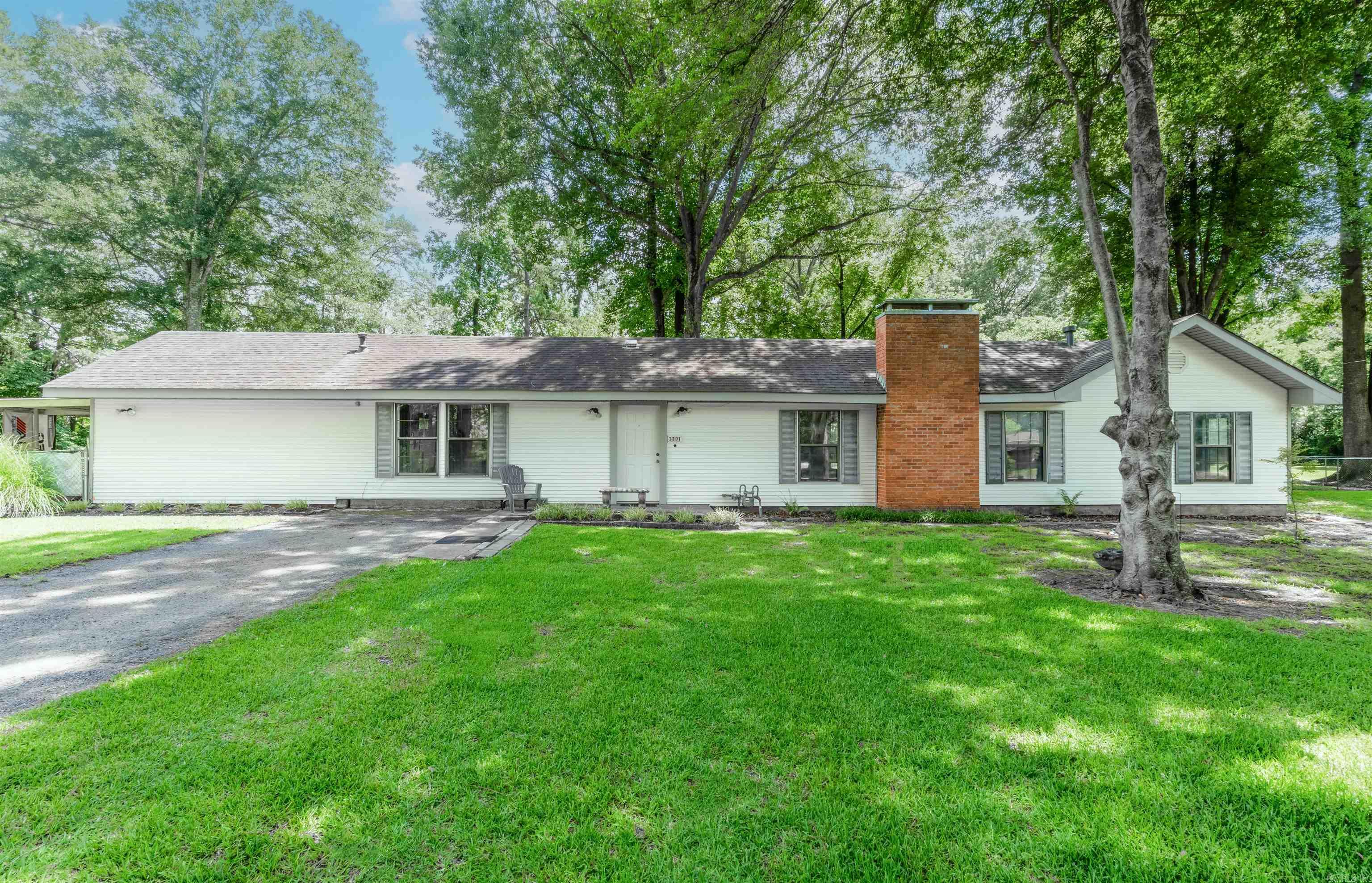 This spacious 3-bedroom, 2-bath home offers plenty of room to live and relax, all set on over five acres backed by mature woods. Enjoy the natural surroundings while staying close to town conveniences. Inside, this move-in ready and well-maintained home provides ample living space for everyday comfort and entertaining. A versatile bonus room adds to the living areas and can be used as an office, playroom, or extra space to fit your lifestyle. The primary bedroom includes a generously sized closet, a bath with an oversized whirlpool tub and separate walk-in shower, and direct outdoor access. The kitchen refrigerator and gas clothes dryer stay with the home, making your move easier. Additional features include two water heaters, solar-powered attic vents, and a whole-house generator that automatically powers on during outages, ensuring comfort and reliability year-round. Outside, youāll find a large paved patio surrounded by mature trees and a lush, gorgeous St. Augustine lawn. The property also includes a small easement along the future Southwest Bike Trail, offering a unique community amenity nearby. Schedule your showing and see if youāre ready to make this house your home!