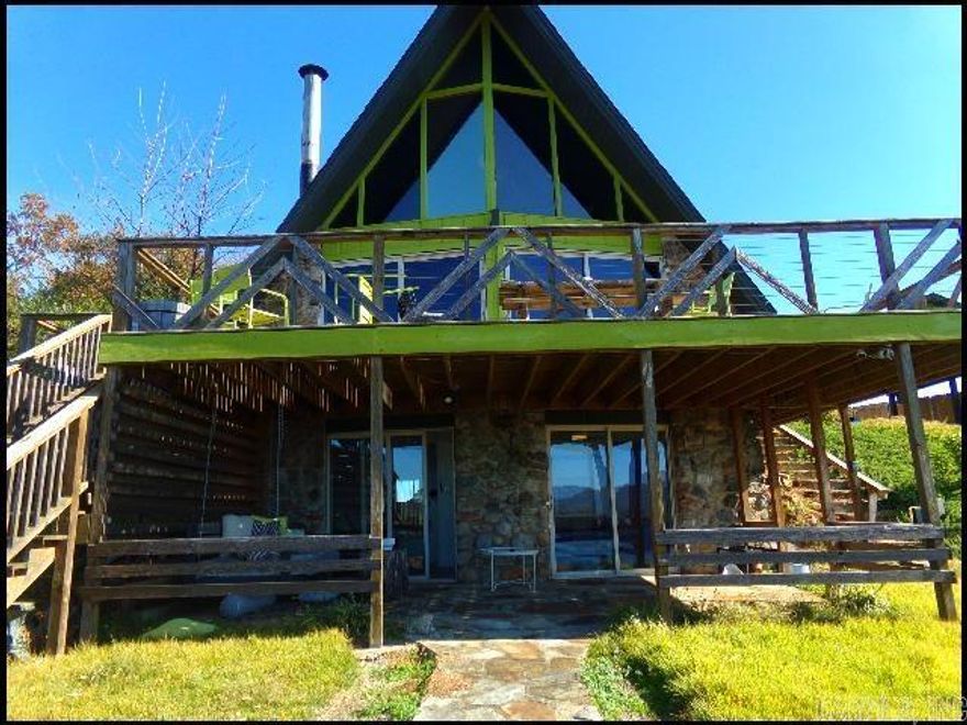 *HOT SPRINGS* BEAUTIFUL FURNISHED LAKE HOUSE IN THE LAKEVIEW COURTS SUBDIVISION!! Experience Breathtaking Lake Hamilton Views From This Stunning 3 Bedroom Mid-Century A-Frame Lakefront Home! Boasting Over 1,400 Sq Ft Of Thoughtfully Designed Living Space, The Main A-Frame Features 2 Spacious Bedrooms, 2.5 Baths, And A Light-Filled Living Area That Opens Onto A Deck With Panoramic Lake Views. The Lower 1 Room Studio Offers A Charming Efficiency With Kitchenette, Full Bath, And Private Patio, Perfect For Guests! Nestled On An Island Off Central Avenue On The Main Channel, This Rustic-Modern Gem Combines Timeless Architecture With Lakeside Luxury. Enjoy Your Private Two-Stall Dock With Lift And Water Slide For Endless Summer Fun! PET FRIENDLY!! AVAILABLE NOW!!!