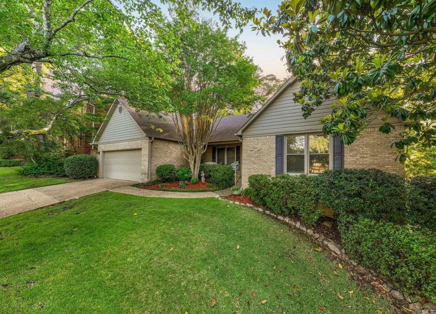 Nestled on a quiet cul-de-sac, this is a rare gem in the sought-after Don Roberts Elementary school zone! With classic light brick exterior, inviting front porch, and well-manicured lawn, this one-level home radiates warmth and timeless appeal.  The interior features a thoughtful open concept living/dining layout with a spacious, vaulted living room, anchored by a light brick fireplace and beautiful hardwood floors.  The dining area flows easily into a cheerful kitchen, complete with updated appliances, ample counter space, and cozy breakfast nook. French doors open to a spacious, vaulted sunroom with ceiling fans, skylights and floor to ceiling windows that fill the room with natural light.  The primary suite features a serene, spa-inspired bath with double vanity and generous walk-in closets.  Two additional bedrooms also feature walk-in closets, ceiling fans and share a lovely double vanity hall bath. The fully fenced backyard is perfect for entertaining and unwinding, with a large deck, beautiful mature trees, and grassy yard for children or pets to play. With classic style and everyday comfort, it's the perfect spot for family living. Agents, see remarks.