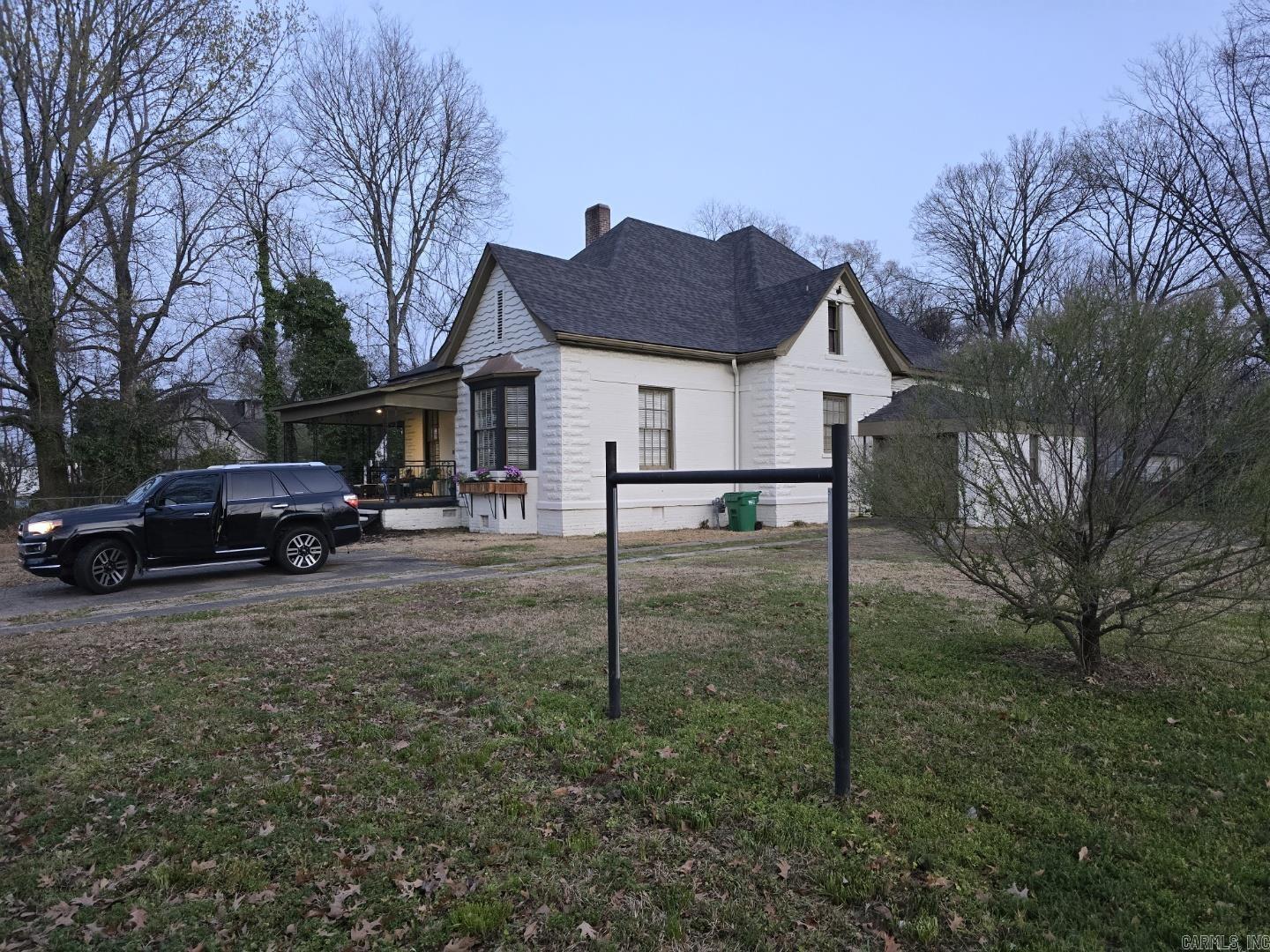 Within the last six years, this home has had a new roof, hot water heater, central heat and air, interior and exterior paint, some flooring, light fixtures, surveillance system, and sewer line replaced. This would make a nice office and has a lot next door for parking. It has a walk up staircase to the huge attic. Both bathrooms have a shower only (no tub). There was also an internet tower added in the back in order to obtain reliable internet. New metal and concrete front steps and iron railings were added. Endless Possibilities with this one.