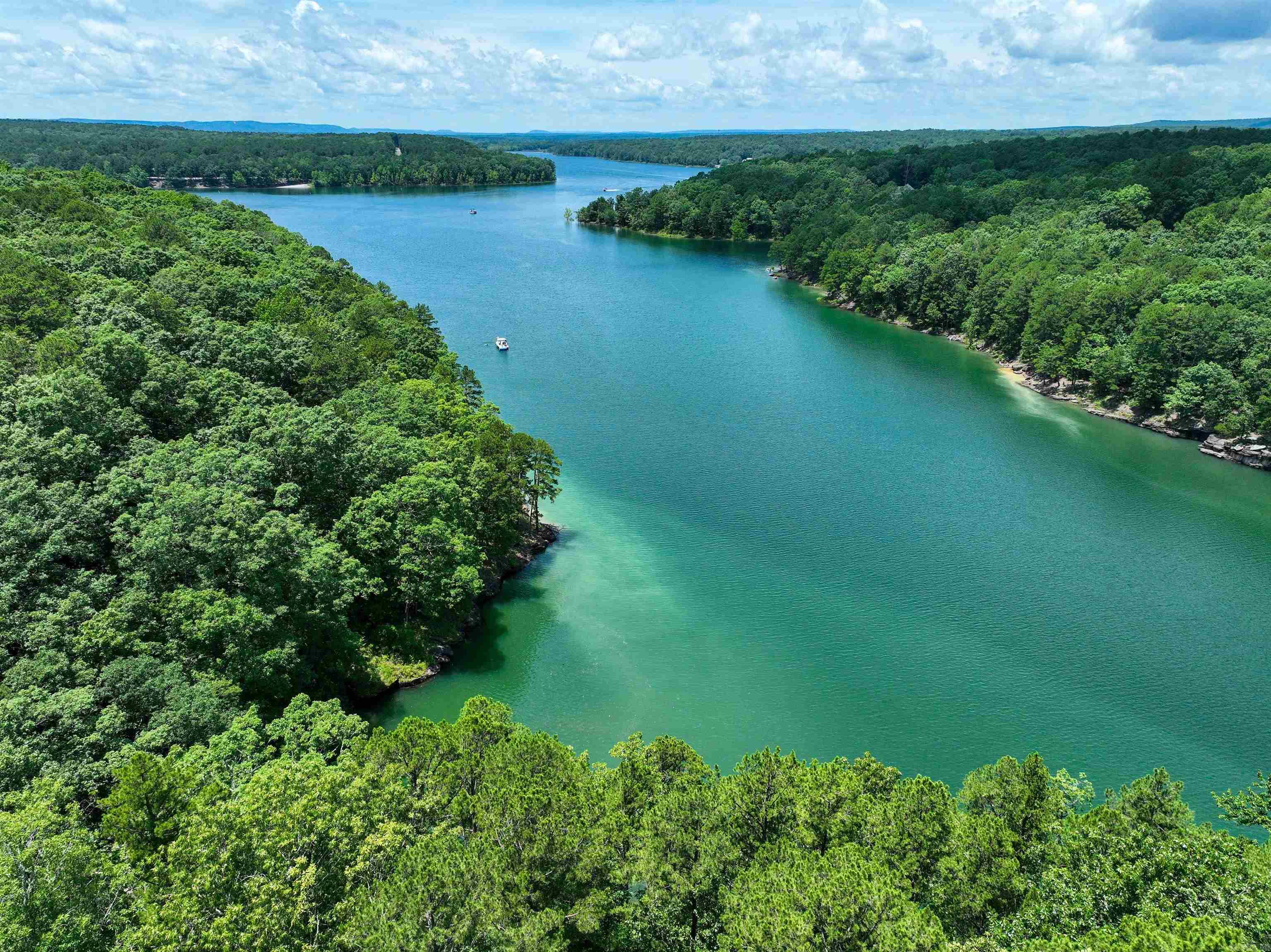 Lakefront home with acreage! If Privacy is what youāre looking for, look no further than this updated 4 bedroom 3 bath home on 6 acres close to Dam Site Marina and Little Red River. If An entertaining deck overlooking Greers Ferry Lake is on your list, this is the perfect place to sip your morning coffee . This home has 2 living areas, one open concept, with windows overlooking the lake and oversized double decks with amazing views too. Follow the wooden steps behind the house for a short walk to the water for a swim. This home is perfect for entertaining, and is ready for you to call your very own.