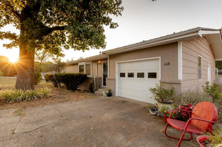 This 2 bedroom 1.5 bathroom home sits on two lots with city conveniences. There is a dedicated laundry room with lots of built-in storage. Living area has updated luxury vinyl plank flooring. An attached garage, metal roof, covered deck and fenced backyard are great features of this home.