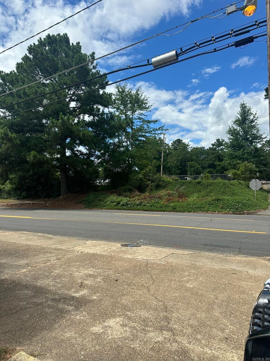 Prime 0.40 Acre commercial lot on a bustling street, surrounded by banks, grocery stores, shopping, restaurants, a pharmacy, and a gas station. Ideal foryour business venture!