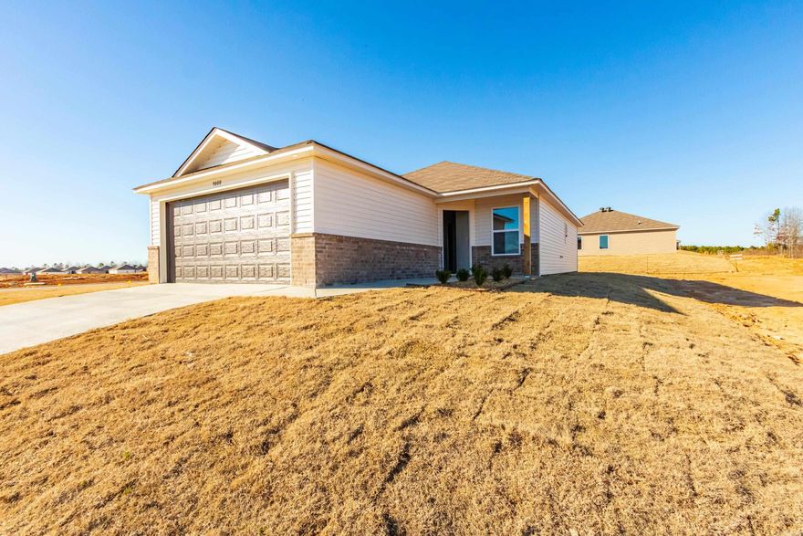 The sweet Carlie II plan - A clever offset front door welcomes you into an entry and an open Living Room, Dining Area and Kitchen. The Master Bedroom is set to the rear of the home for more privacy.  Thoughtful upgrades included: plumbing faucet upgrade 2, gas furnace upgrade, door bell, Luxury Vinyl Plank flooring in wet areas and Living Room and adjacent hallways, Cheyenne style interior doors, baseboards level 2, crown molding in Living Areas and Master Bedroom, attic stairs, full sod, microwave hood in Kitchen, smooth top range.   THIS HOME IS COMPLETE.