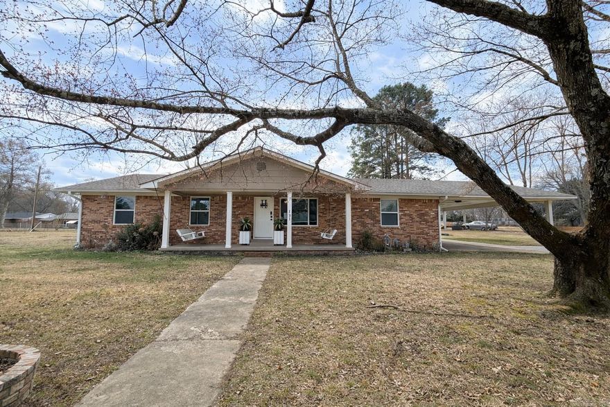 This beautifully updated home is sitting on a corner lot. If you are looking for move-in ready in the heart of Searcy, this is it. With two living areas, an extra spacious laundry room with pantry space, a fenced-in back yard, and a newly built carport, you are sure to have plenty room. So many updates: kitchen and bathroom remodels, paint, luxury vinyl flooring, shiplap ceiling, new duct work, 3 year old roof and hvac, new electric panel, new storage building, and the list goes on. Come check it out for yourself.
